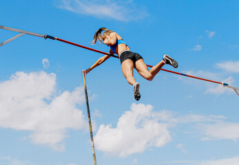 woman athlete pole vaulter successful attempt