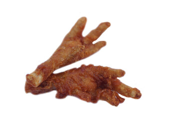 Fried crispy chicken feet isolated on white background. Concept, weird, exotic food. delicious and popular street food in Thailand