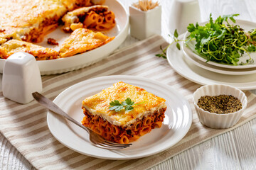 Greek Pastitsio on white plate, top view