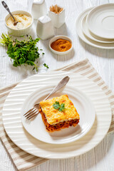 Greek Pastitsio on white plate, top view