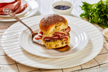 Hawaiian Ham and Swiss Slider on white plate