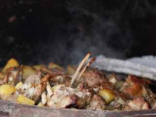 zum zeri lamb cooked in a really big container called testo a tasty specially of tuscany