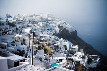morning fog on village of Imerovigli Santorini island