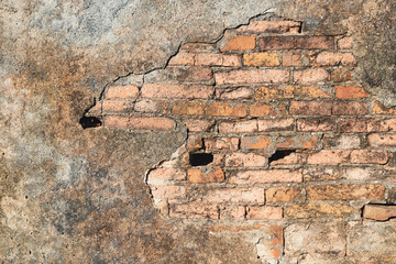 ancient temple wall texture Built with red bricks and plastered with cement. naturally weathered.