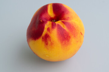 CLOSE-UP OF A PEACH
