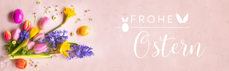 Colorful signs of spring for happy easter greetings on tender pink. Horizontal background for...
