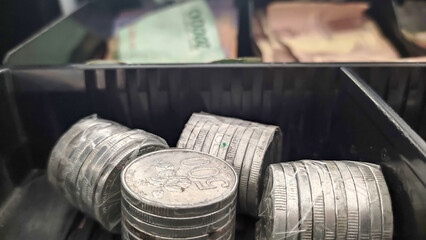 Obraz premium euro coins in a jar