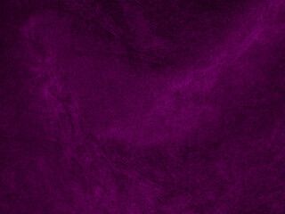 Purple velvet fabric texture used as background. Empty purple fabric background of soft and smooth textile material. There is space for text..