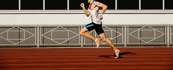 male runner sprinter run on track stadium in athletics