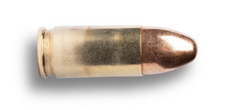 Shadow behind and below a 9 mm pistol cartridge