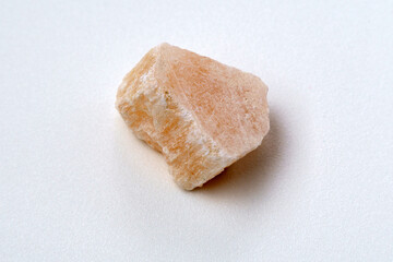 Red Gypsum stone mineral, white background, close-up, black background
