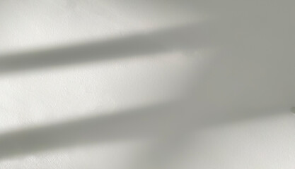 Gray shadow and light blur abstract background on white wall  from window.  Dark grey shadows indoor in room  background, monochrome, shadow overlay effect for backdrop and mockup design