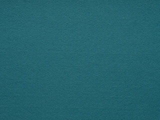 Cyan or blue texture of felt fiber. Natural wool for text, lettering, patchworkor 3d art work. Full frame backdrop wallpaper. Full frame retro velvet pattern or vintage background in high resolution.
