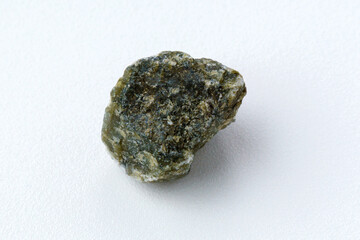 Raw labradorite of natural mineral from geological collection. White background
