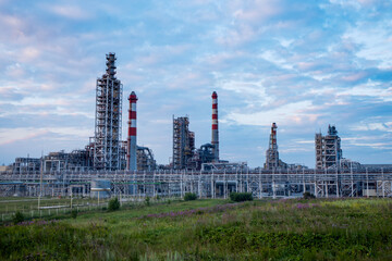 The building of an industrial enterprise at dawn. Building silhouette. 