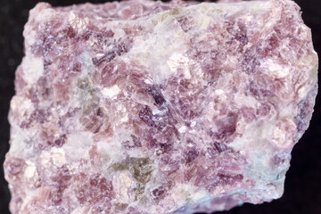 Lepidolite stone macro, being a secondary source of lithium, used in batteries