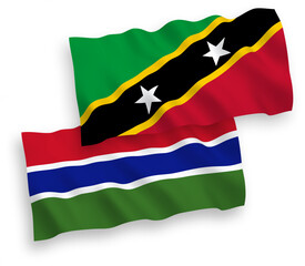 Obraz premium Flags of Federation of Saint Christopher and Nevis and Republic of Gambia on a white background