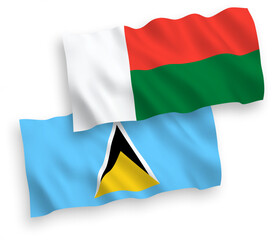 Flags of Saint Lucia and Madagascar on a white background