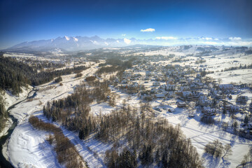 Winter panorama of Bialka Tatrzanska  on the Bialka river.  On the background Tatra Mountains....