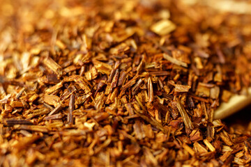 Tea drink rooibos made from the leaves, stems and flowers of a South African plant. Selective focus