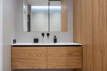 Bright elegant bathroom interior in a luxury house