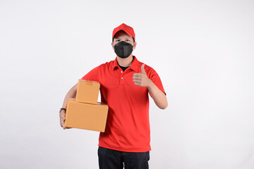 Delivery man employee in red cap blank t-shirt uniform