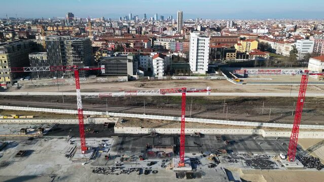 EUROPE, ITALY, MILAN 2023 - Drone aerial view of Scalo Porta Romana, building construction of Olympic Village for Milan-Cortina 2026 Winter Olympics games in downtown of the city near Prada Tower  
