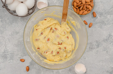 Recipe step by step. The process of making Italian cantucini cookies. Finished dough with almond in...