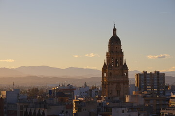 Fototapeta premium Sunset in Murcia with the cathedral tower in the background
