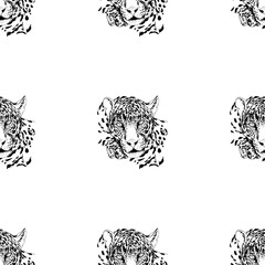 Seamless pattern of hand drawn sketch style leopards isolated on white background. Vector illustration. - 573286461