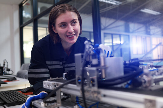 New Generation woman learning AI and robotic technology , Automation technology  education , Science and Technology class in university