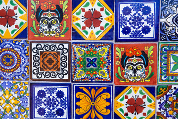 Colorful, patterned ceramic tiles on a wall in Cabo San Lucas, Mexico
