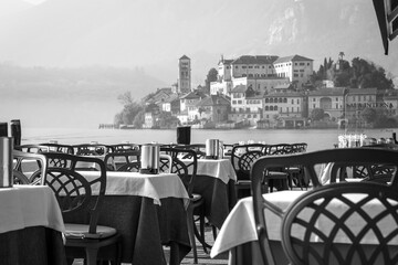 Restaurant dehor at the Orta Lake; of glacial origin, is a little lake in Northern Italy, Piedmont Region, divided between the Provinces of Novara and Verbania.