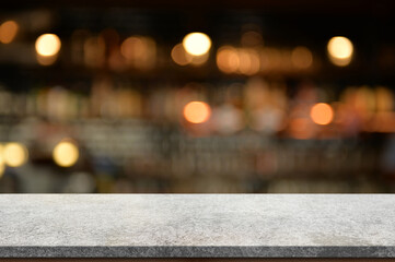 Empty white marble stone table top and blur interior cafe and restaurant.	
