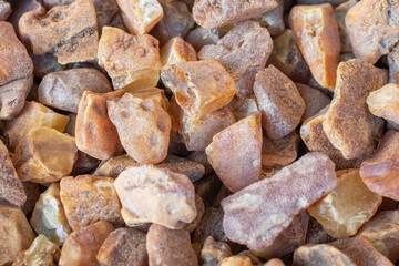 Unpolished amber stones. Natural precious material used as jewelry and decorative objects