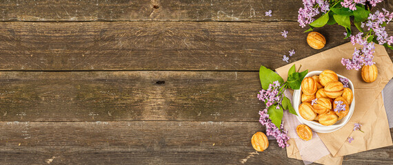 Cookies in the shape of walnuts with condensed milk cream filling.Delicious shortbread sandwiches