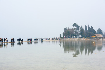 Garda Lake, Brescia Italy - 02 19 2023: Drought on Lake Garda