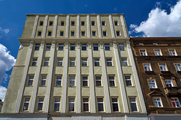 Classicist facade with pilasters of a historic tenement house in the city of Poznan