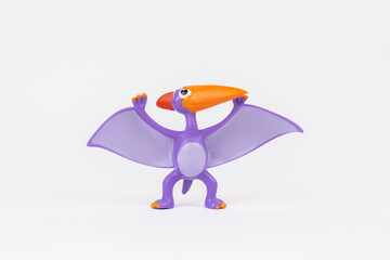 pterodactyl dinosaur figure children's toy on a white background © dyachenkopro