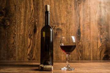 Bottle for wine with a glass and corks