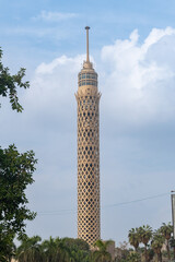Cairo Tower seen from a part of the city, on a sunny day.