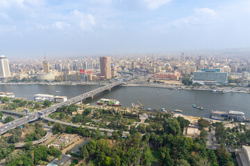 Fototapeta na wymiar Cairo city seen from the heights of the Cairo Tower, on a sunny day with a lot of pollution.