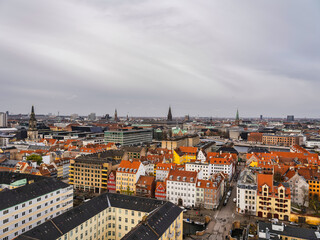 Fototapeta na wymiar Historic Danish city Copenhagen and colorful buildings during a cloudy day, Denmark
