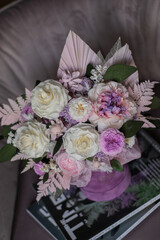 A mix of pink peonies with purple and pink roses . Bouquet of tenders peonies a girl for mother's day, valentine's day, Woman's day 8 march.
