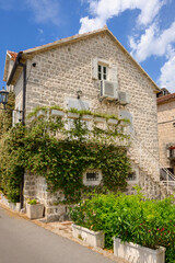 Fototapeta na wymiar Typical house, architecture of Perast - one of the most beautiful towns on Montenegro coast. Europe