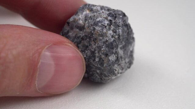 Natural mineral stone cordierite gemstone, geological collection raw crystal
