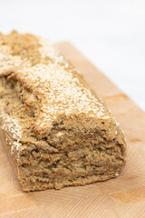 Homemade delicious integral flour bread sliced on the wooden board