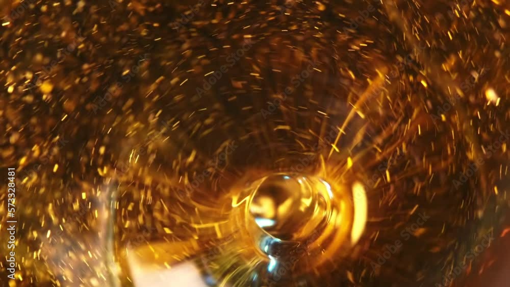 Fototapete abstraction of a swirl in golden liquid going into deep with a reflection on its surface with a lot 