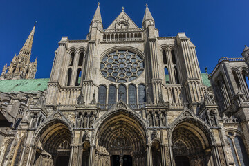Architectural fragments of Roman Catholic Chartres Cathedral or Cathedral of Our Lady of Chartres (Cathedrale Notre Dame de Chartres, 1220). Chartres (80 km southwest of Paris), Eure-et-Loir, France.