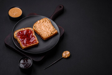 Nutritious sandwiches consisting of bread, raspberry jam and peanut butter